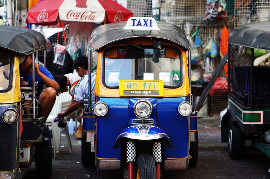 Yellow and blue auto rickshaw in Thailand